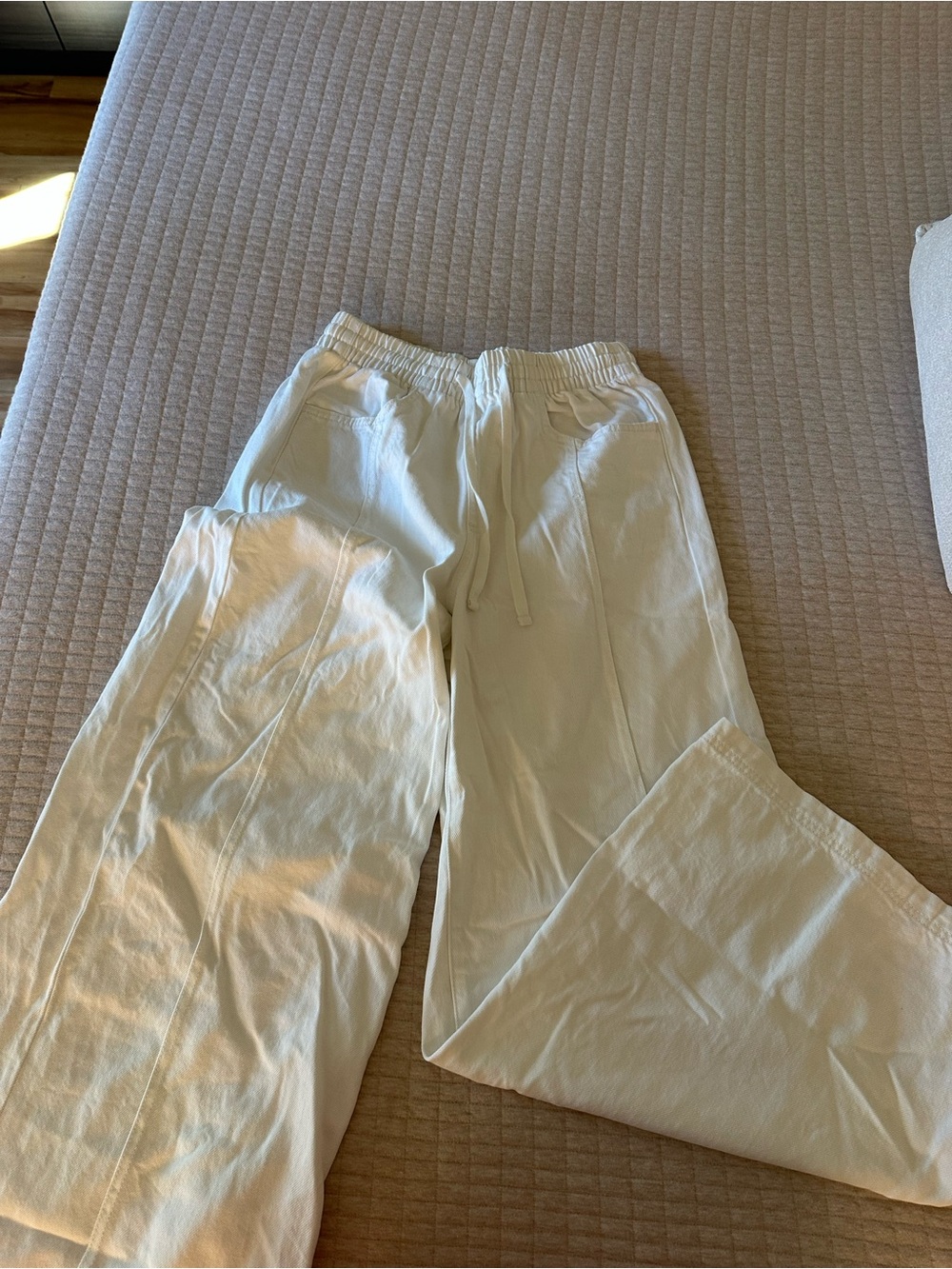 Women’s White Wide Leg Jeans with drawstring feature